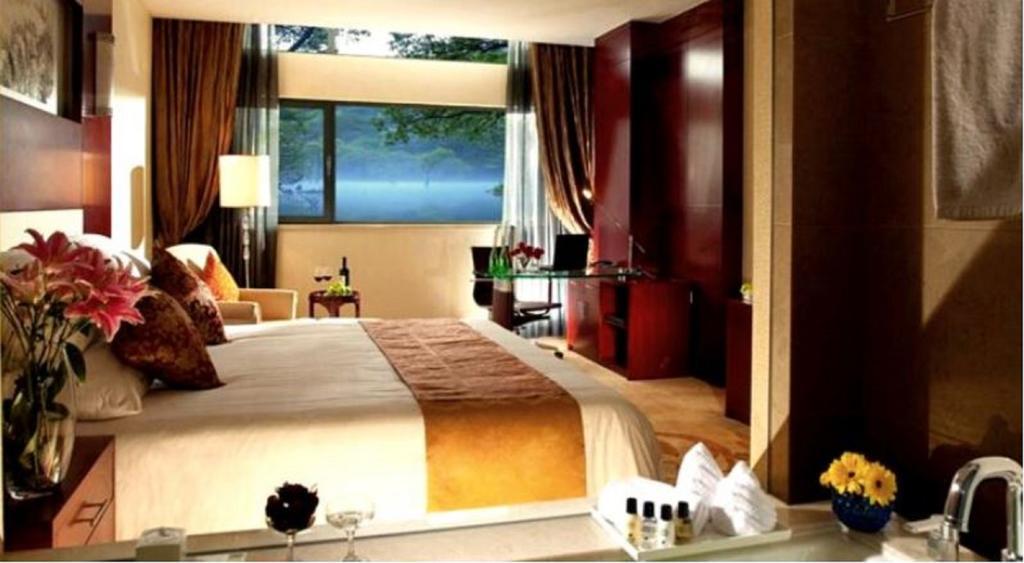 New Century Fengming Resort Zaozhuang Bilik gambar